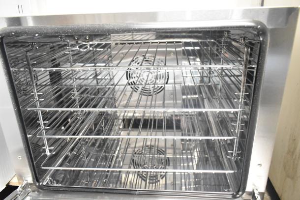 Avantco 177CO28M half-size countertop convection oven, brand new, 2.3 cu. ft., with visible broken glass. 208/240V, 1 phase.