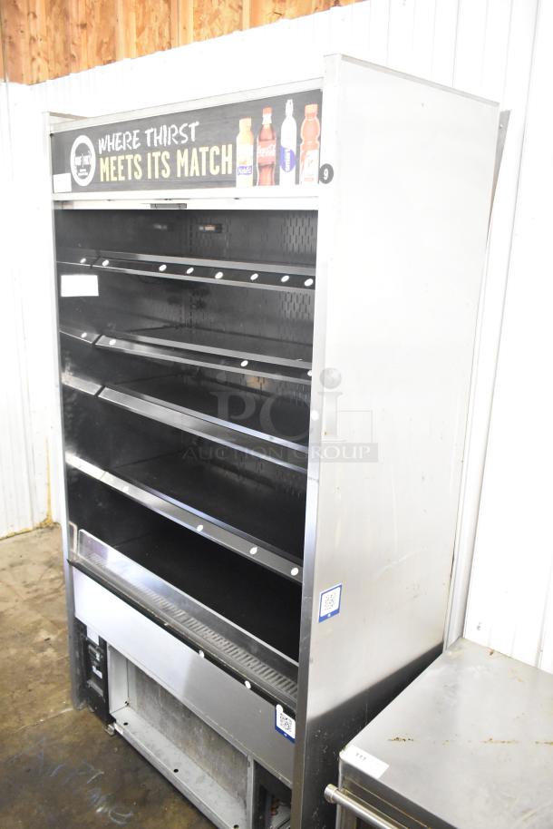 Structural Concepts Oasis B42 merchandiser, open-style, commercial, 120V, good condition, visible drink branding.