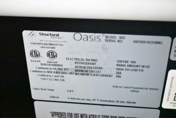 Structural Concepts Oasis B42 Commercial Merchandiser label. Displays electrical specs, refrigerant info, and certifications.