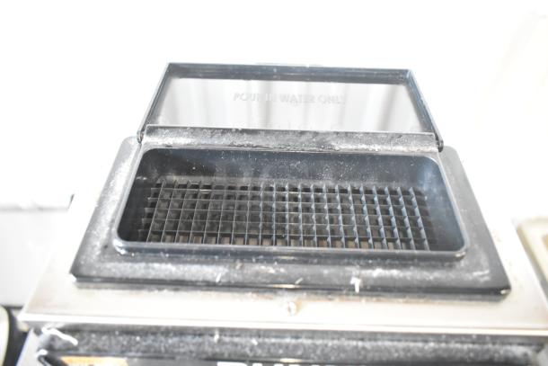 Bunn CWTF35-APS Airpot Brewer, shows top view of water inlet labeled "Pour in Water Only." Minor wear visible.