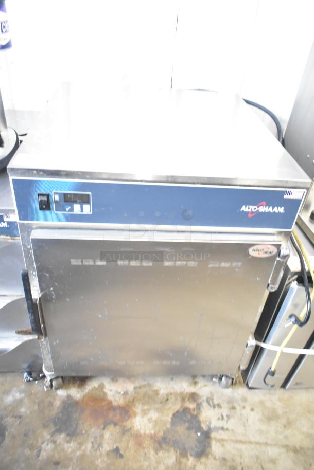2017 Alto Shaam 750-S Halo Heat insulated mobile heated cabinet, 1/2 height, 120V, on commercial casters, in good condition.