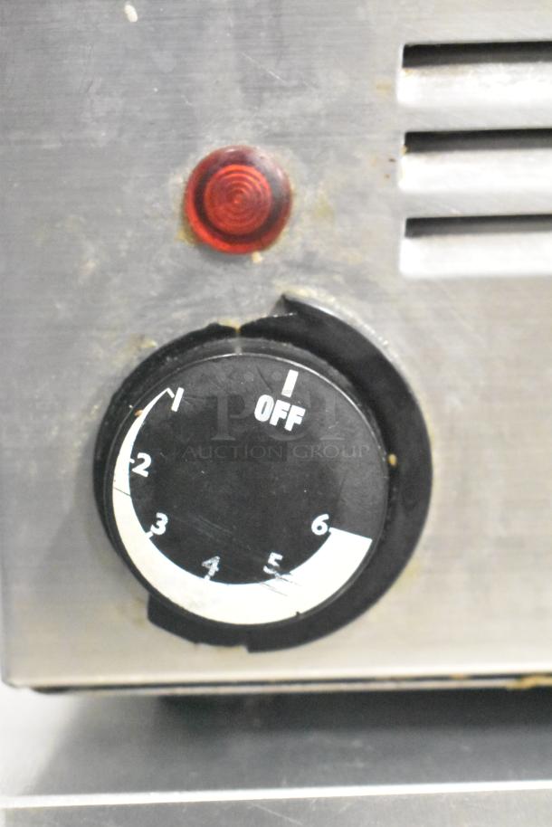 Patriot FMFW-1200W food warmer dial and indicator light; stainless steel, 120 volts, 1 phase, well-worn condition.