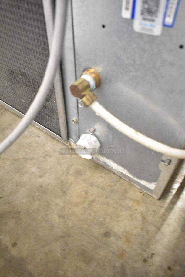 2019 Ice-O-Matic CIM0430HA Elevation Series ice machine, 115V, showing rear panel connections and condition details.