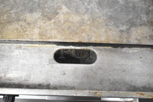 Garland E24-36G electric griddle, well-used condition, 208 volts, 1/3 phase, countertop design, commercial use.