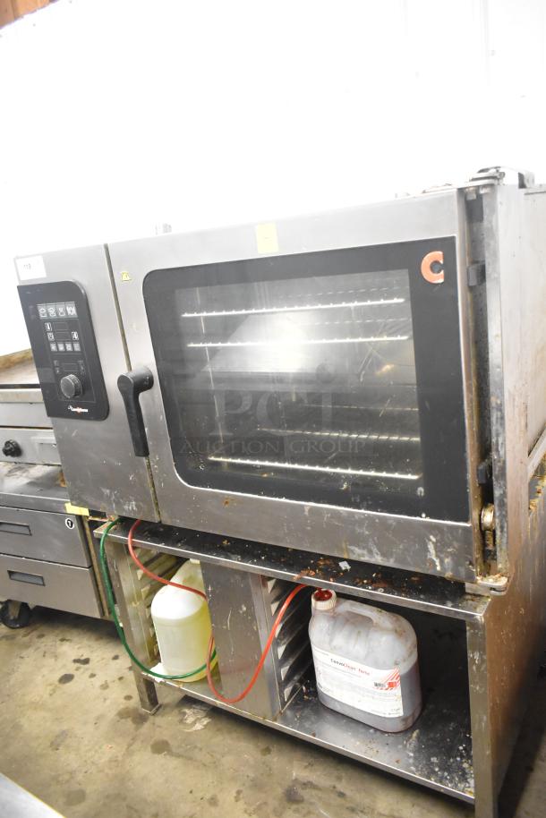 Convotherm C4eD6.20ES-N stainless steel combi convection oven on stand, 208/240V, 3-phase, electric, visible control panel.