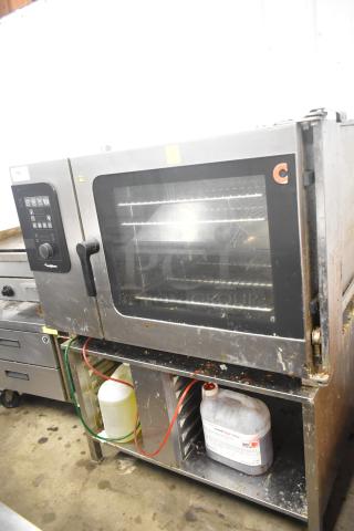 Convotherm C4eD6.20ES-N stainless steel combi convection oven on stand, 208/240V, 3-phase, electric, visible control panel.