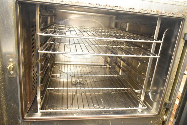 Convotherm C4eD6.20ES-N stainless steel electric combi convection oven, interior view, 208/240V, 3 phase, on stand.