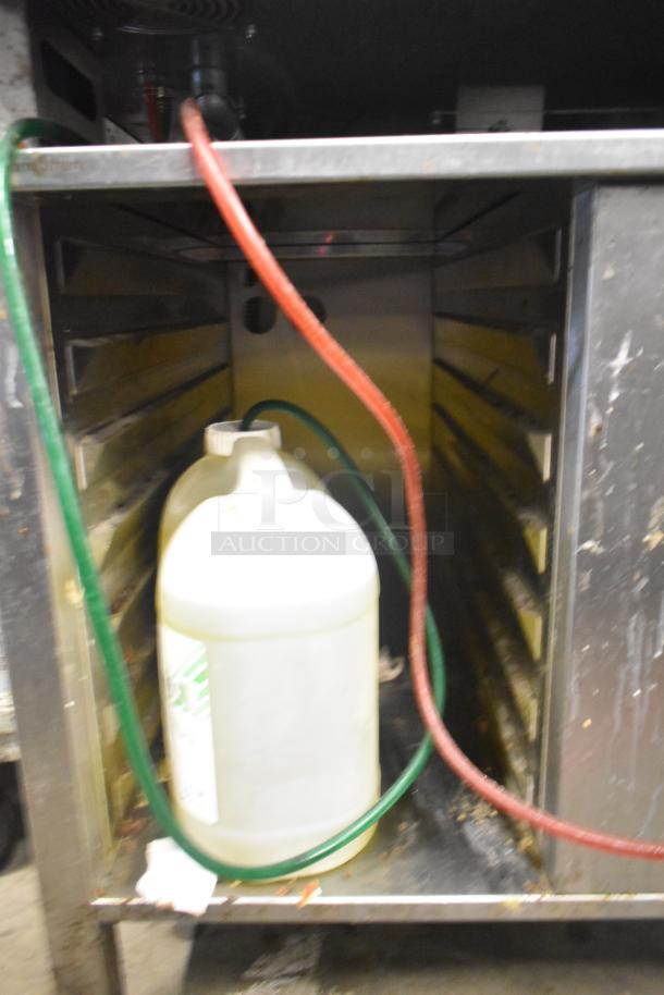 Convotherm C4eD6.20ES-N stainless steel combi convection oven on stand, 208/240V, 3-phase, shown with cleaning hoses.