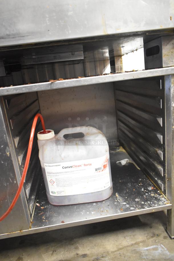 Convotherm C4eD6.20ES-N stainless steel combi oven on stand, visible ConvoClean forte container, 208/240V, 3 phase.