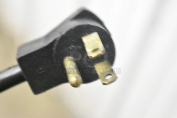Close-up of a power plug for a Beverage Air commercial sandwich salad prep table, 115 volts, 1 phase.