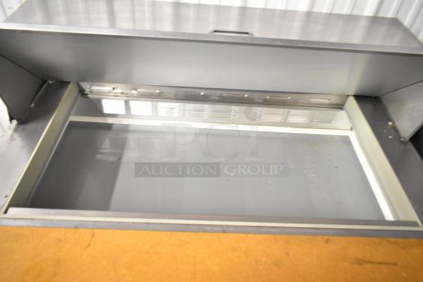 Beverage Air commercial sandwich salad prep table, stainless steel, mega top, commercial casters, 115 volts, 1 phase.