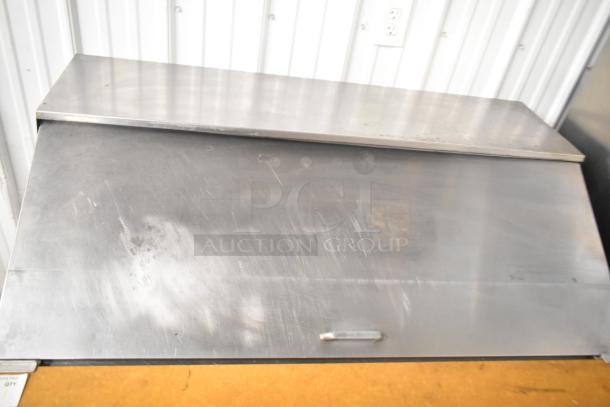 Beverage Air sandwich salad prep table, mega top, stainless steel, on commercial casters. 115 volts, 1 phase, good condition.