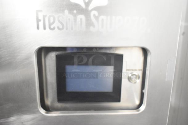 LATE MODEL JBT 2ND-GEN-MFJ-HE citrus juicer with "Fresh N Squeeze" display, commercial casters, 115V, 1 Phase.