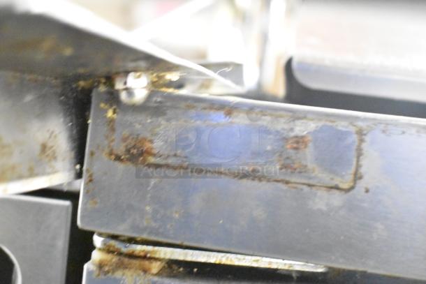 2017 Delfield 4460N-24M prep table, missing lid, visible rust and wear, 115V, 1 Phase.