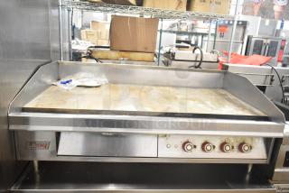 Lang 48T commercial electric flat top griddle with thermostatic controls, 208/240 volts, stainless steel, used condition.