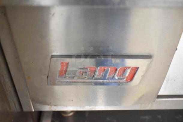 Lang 48T Commercial Electric Griddle with thermostatic controls, 208/240 volts. Features Lang brand plate. Some wear visible.