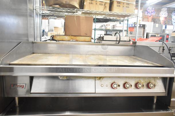 Lang 48T Commercial Electric Griddle, thermostatic controls, 208/240 volts, stainless steel, used condition, visible grease marks.
