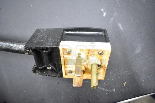 Plug and cord for a 2023 Turbochef HHD ventless oven, 208/240 volts, 1 phase. Rust visible on plug prongs, indicating wear.