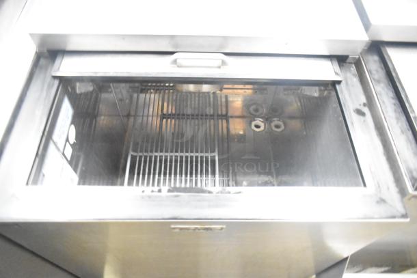 Perlick BC24 Commercial Back Bar Bottle Cooler, 115 Volts, 1 Phase. Interior racks visible, stainless steel finish.