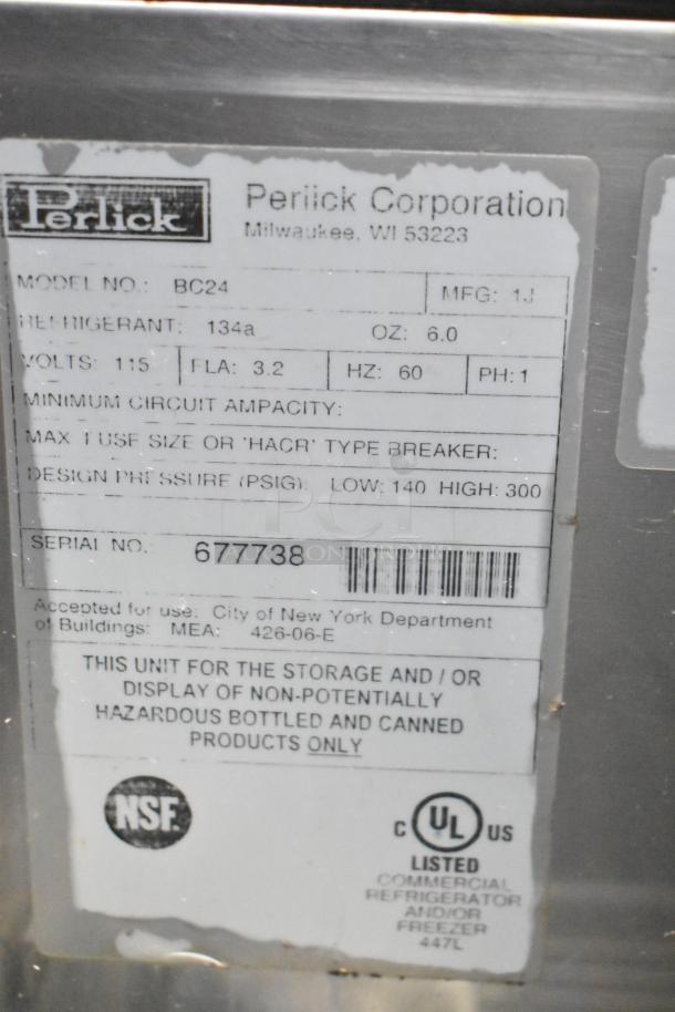 Perlick BC24 commercial back bar bottle cooler label, showing details like model, voltage, and refrigerant type.