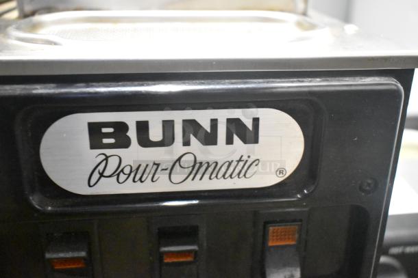 Bunn SP Commercial 3 Burner Coffee Machine, 120V. Features "Pour-Omatic" label. Used condition with visible wear.