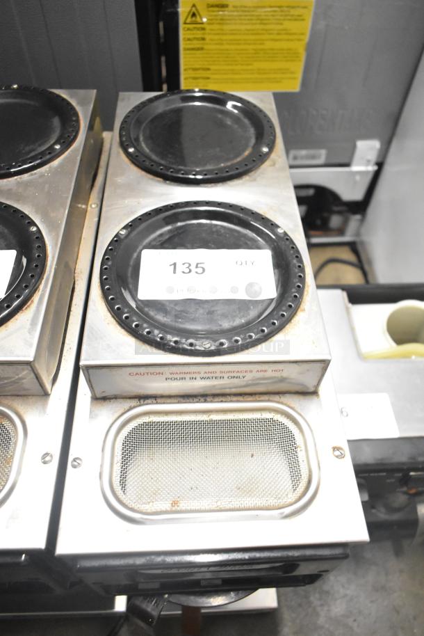 Bunn SP Commercial Coffee Machine, 3 burners, stainless steel. Displays wear. Label reads "135 QTY". 120V, 1 Phase.