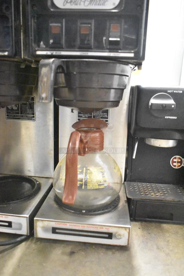 Bunn SP Commercial Coffee Machine with 3 burners, countertop model, 120V, 1 phase. Includes glass decanter. Good condition.