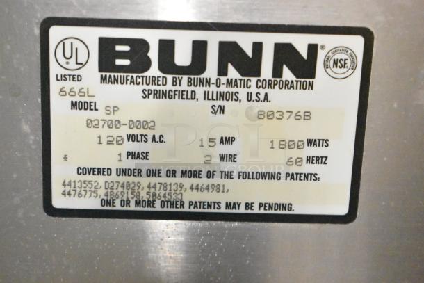 Bunn SP Commercial Coffee Machine label showing model, 120V, 15A, 1800W, and patent information.