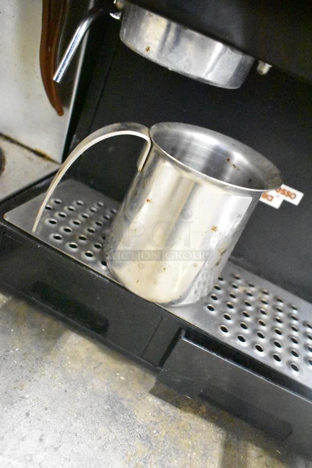 Espresso Italia Easy Cup 300 machine, 115V, countertop model, with stainless steel finish. Visible wear on metal surfaces.
