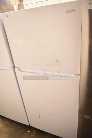 Brand new Vissani MDTF18WHR5 cooler with freezer, visible scratches and dents, 115 volts, 1 phase, model label on top.