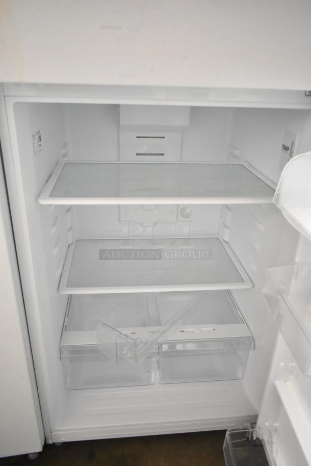 Brand new Vissani MDTF18WHR5 cooler with freezer, 115V, 1 phase. Interior shelves visible, minor exterior scratches.