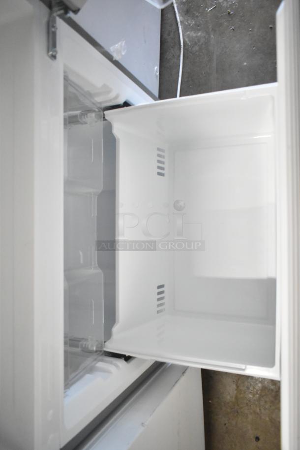 Brand new Vissani MDBF18SS cooler with freezer drawer, 115 volts, 1 phase. Scratch and dent condition.