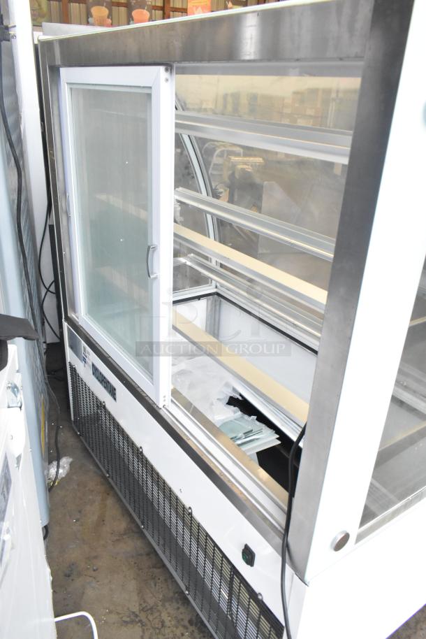 Brand new Avantco 193BCTD48W 48" white curved glass bakery display case, 3 shelves, LED lighting, minor scratches.