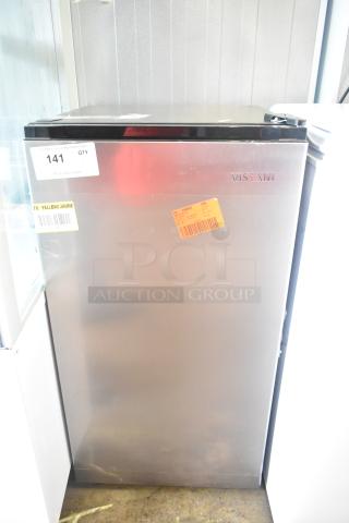 Brand new Vissani HVAR32SE Mini Cooler, 2025 model, 115V, 1 Phase, visible scratches and dents, auction tag #141.