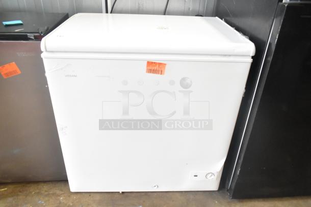 Brand new Vissani DCM7QWBWW chest freezer, 2025 model, manual defrost, 115V, slight scratches and dents visible.