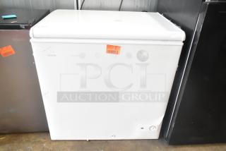 Brand new Vissani DCM7QWBWW chest freezer, 2025 model, manual defrost, 115V, slight scratches and dents visible.