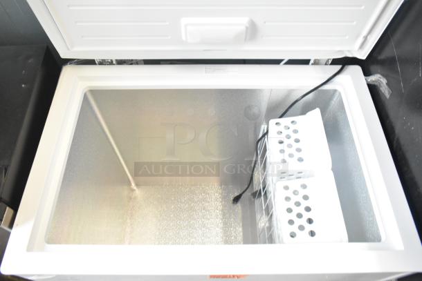 BRAND NEW Vissani DCM7QWBWW chest freezer, manual defrost, visible wire baskets, 115V, shows minor scratches.