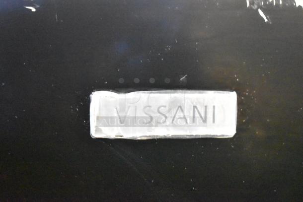 Vissani logo on black surface, indicating the brand of the 2025 MDTF10BKES4 Reach In Cooler with Freezer.
