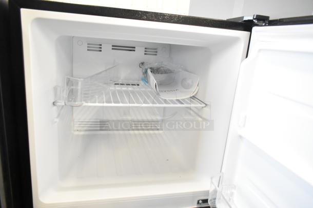 Alt text: Vissani MDTF10SSES4 Reach In Cooler with Freezer, new but with scratches. White interior, single shelf, 115 volts, 1 phase.