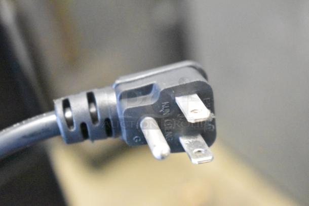 Three-prong power plug of a Vissani MDTF10SSES4 Reach In Cooler. Brand new, 115 volts, 1 phase.