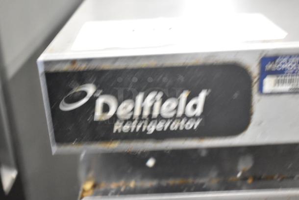 2017 Delfield GUR48P-D commercial cooler, stainless steel, 4 drawers, 115 volts, 1 phase, visible logo and model label.