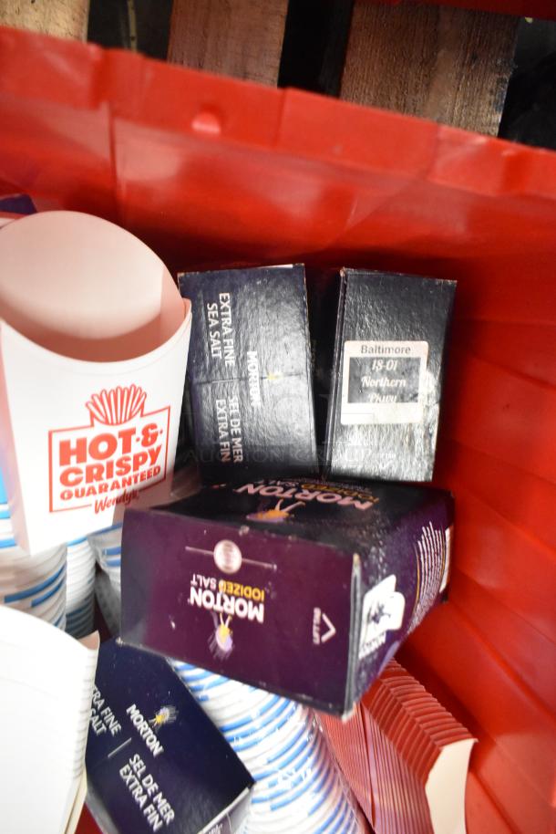 13 red poly bins with contents like napkins, bin drop-ins, cups, utensils. Includes Morton salt boxes, Wendy's branded items.