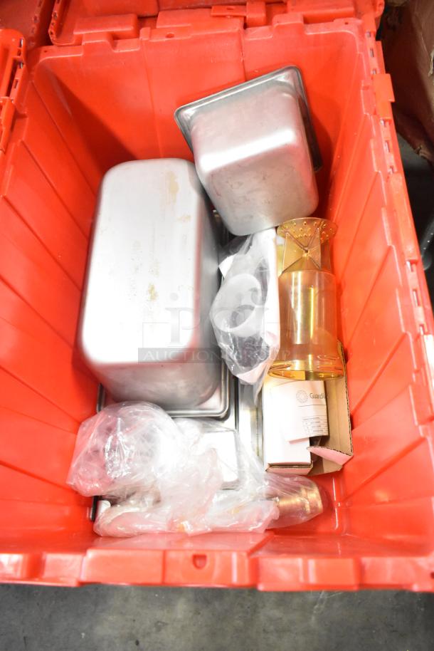 Red poly bin containing napkins, dedicated holding bin drop-ins, cups, and utensils. 13 bins total per bid.