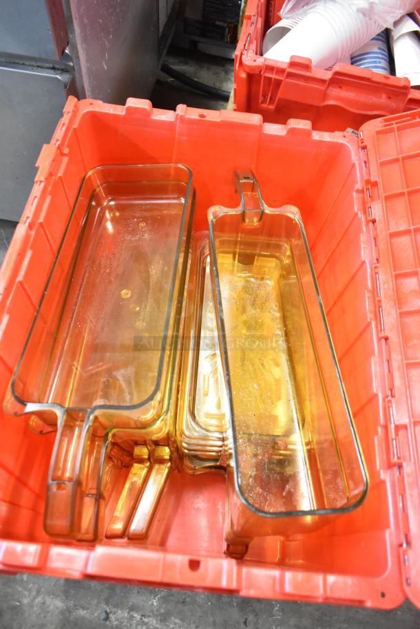 13 red poly bins containing napkins, drop-ins, cups, and utensils. Includes clear color, stackable design.