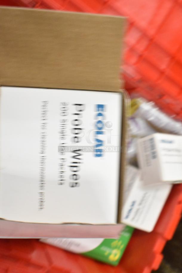 13 red poly bins with napkins, utensils, cups, and Ecolab probe wipes. Includes holding bin drop-ins. Auction lot multiplies bid by 13.