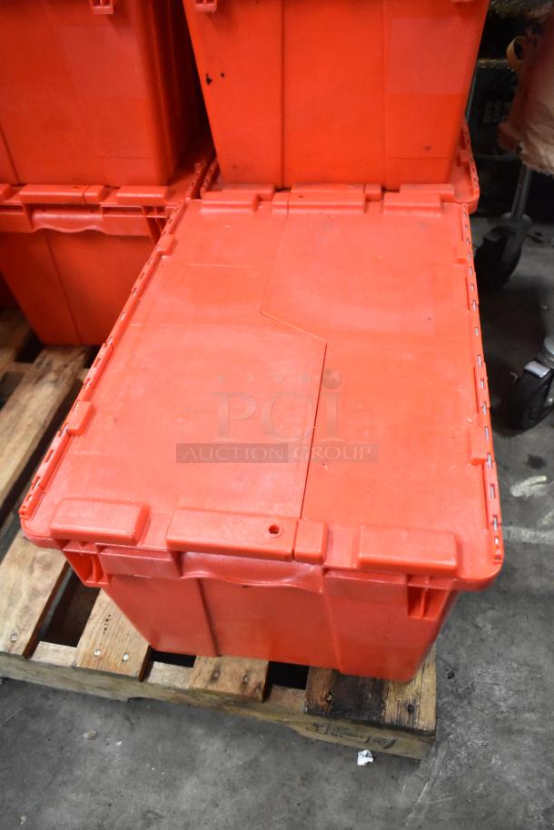 13 red poly bins filled with napkins, cups, utensils. Durable, stackable, used condition. Auction lot, 13 times bid.