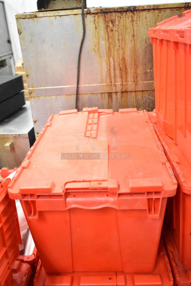 13 red poly bins containing napkins, bin drop-ins, cups, and utensils. Includes durable latches and stacking design.