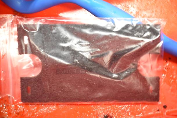 Red bins with assorted contents, including napkins, cups, utensils, and holding bin drop-ins; auction lot of 13.