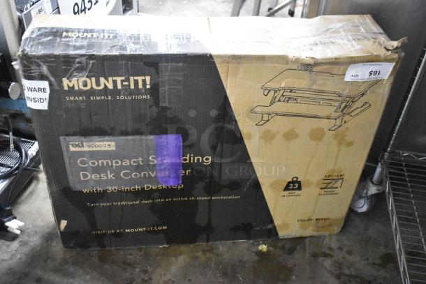 IN ORIGINAL BOX! Mount-it! Compact Standing Desk Converter, 30-inch desktop, height adjustable, color black. Box shows signs of wear.