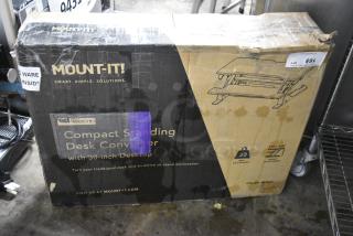 IN ORIGINAL BOX! Mount-it! Compact Standing Desk Converter, 30-inch desktop, height adjustable, color black. Box shows signs of wear.